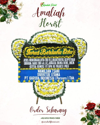 Papan Bunga Duka di Muara Harus