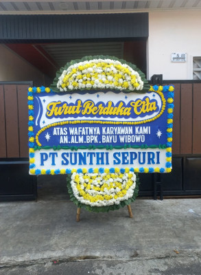Papan Bunga Duka di Muara Harus